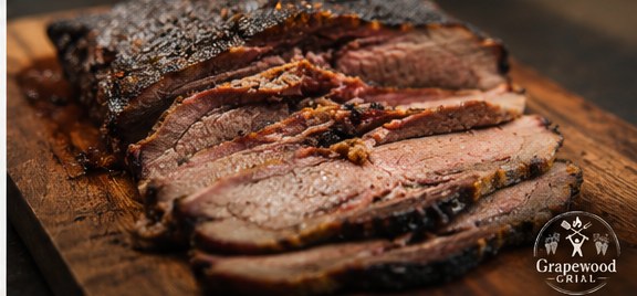 Whole smoked tri-tip on cutting board